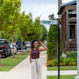 Person standing in front of a street