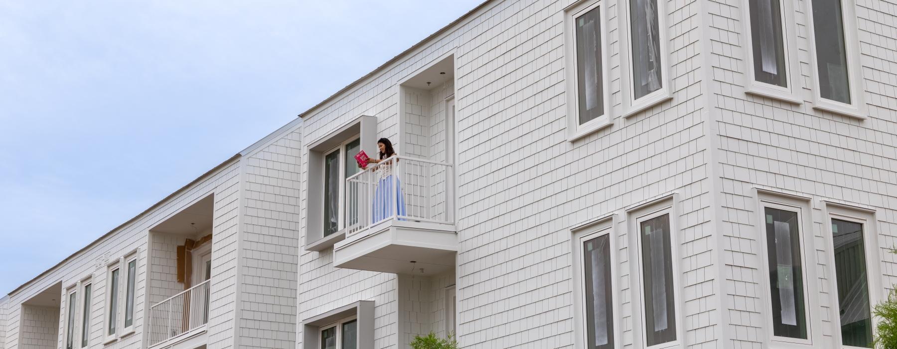 a couple of people on a balcony