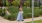 a woman walking by a local attraction